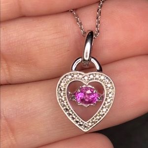 Heart pendant with pink heart that floats